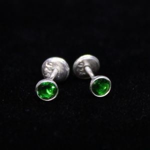 Emerald and Silver earrings.